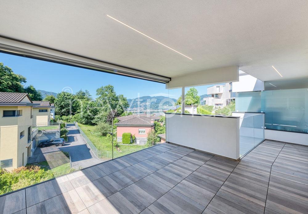 affittasi nuovo attico moderno con ampia terrazza a montagnola: foto ampia terrazza