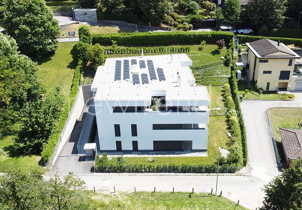 vendesi moderno appartamento con ampio giardino a montagnola: foto vista aerea