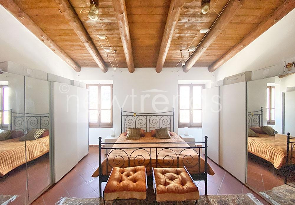 vendesi casa di nucleo con affascinanti scorci di lago a mendrisio-capolago: foto camera da letto