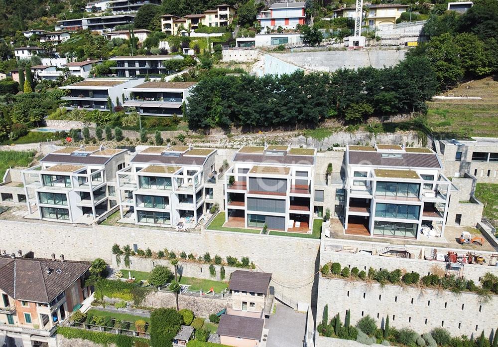 ultimo nuovo appartamento 3.5 locali con giardino e stupenda vista lago a morcote: foto vista aerea immobili