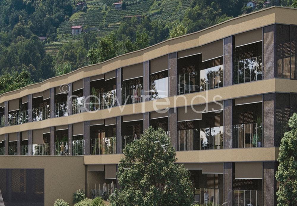 vendesi panoramicissimo 3.5 con terrazza ultimo piano  a bioggio: foto render esterno immobile