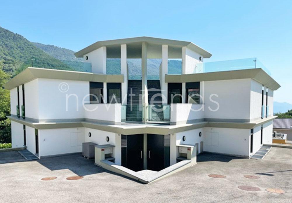 vendesi villa gemella contigua con rooftop e vista aperta a sonvico: foto esterno immobile